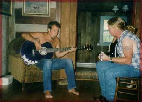 Robert plays along as Dave plays him some new material at Rob's house